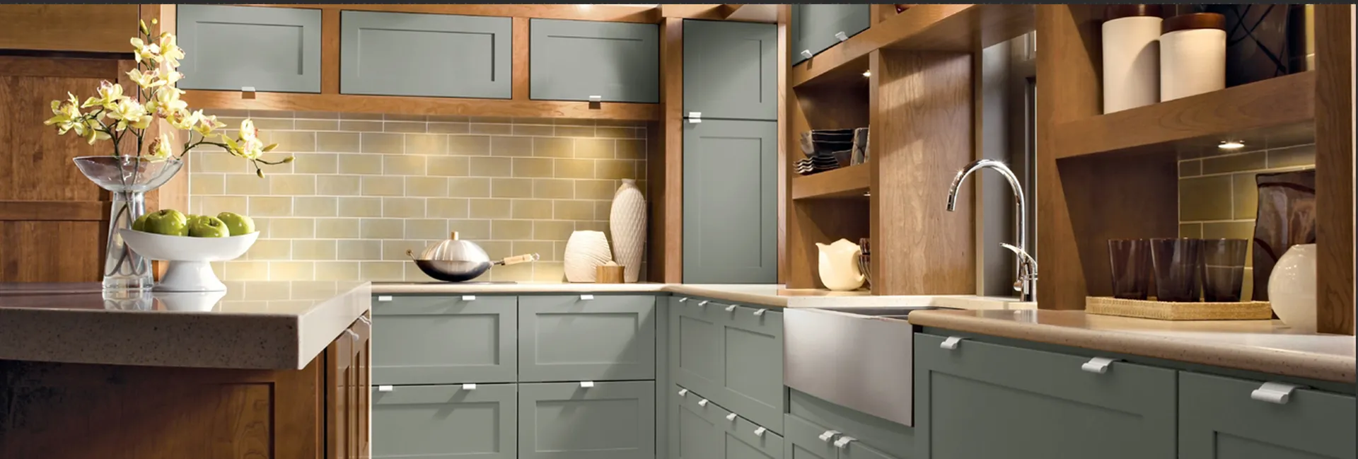 Large kitchen with premium wooden cabinets, gray base, and island.